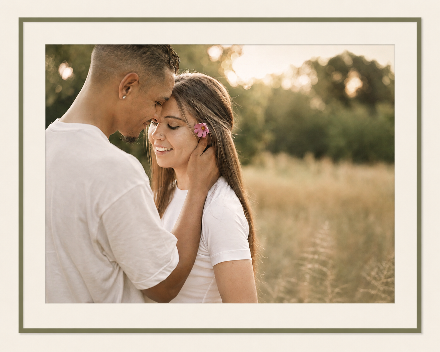 Chad and Jenn sharing a quiet moment in a golden field